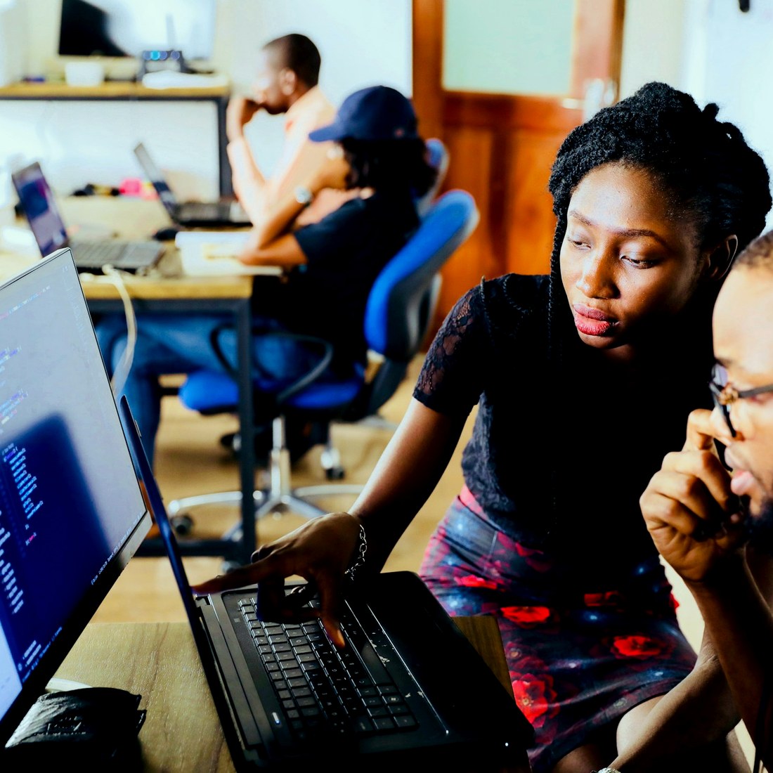 Équipe en session de développement — pair-programming